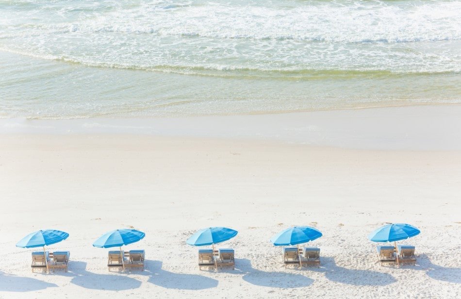 Chairs and umbrellas lines up along Orange Beach, Alabama